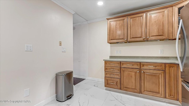 115 Aspen Cir E, Stroudsburg, PA 18302 - kitchen with crown molding, brown cabinetry, light marble finish flooring, light countertops, and stainless steel refrigerator