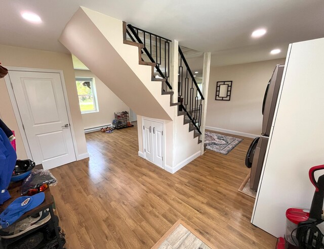 20 Occoquan Trl, Albrightsville, PA 18210 - stairs with baseboard heating, wood finished floors, baseboards, and recessed lighting