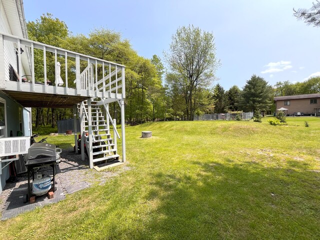 20 Occoquan Trl, Albrightsville, PA 18210 - view of green lawn featuring stairway, a deck, and view of scattered trees
