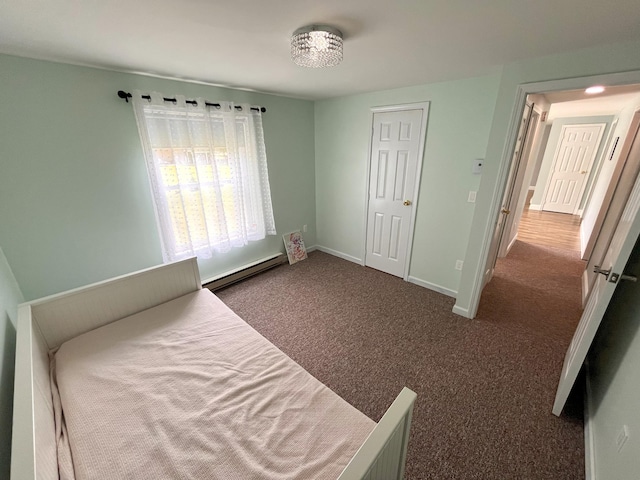 20 Occoquan Trl, Albrightsville, PA 18210 - unfurnished bedroom featuring a baseboard heating unit, baseboards, and carpet floors