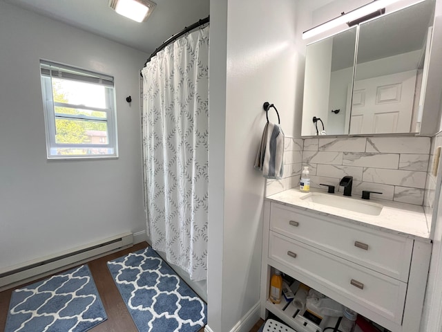 20 Occoquan Trl, Albrightsville, PA 18210 - bathroom with a baseboard radiator, decorative backsplash, vanity, and baseboards