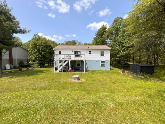 20 Occoquan Trl, Albrightsville, PA 18210 - back of property with stairs, a deck, and a yard
