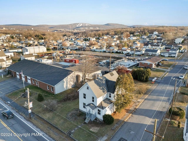 drone / aerial view with a residential view and a mountain view