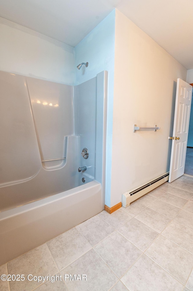 bathroom featuring tile patterned floors, shower / bath combination, baseboards, and baseboard heating