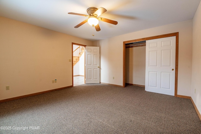 unfurnished bedroom with a closet, a ceiling fan, baseboards, and carpet floors