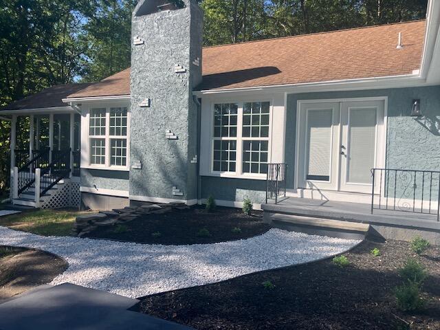 3354 Trafalgar Ave, East Stroudsburg, PA 18302 - rear view of property featuring a chimney and roof with shingles