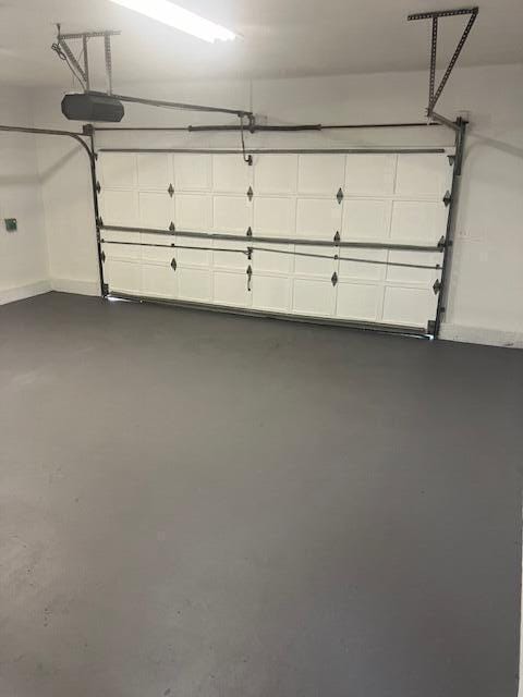 3354 Trafalgar Ave, East Stroudsburg, PA 18302 - garage with a garage door opener and baseboards