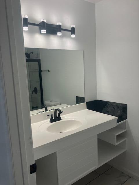 3354 Trafalgar Ave, East Stroudsburg, PA 18302 - bathroom featuring a shower with shower door and vanity