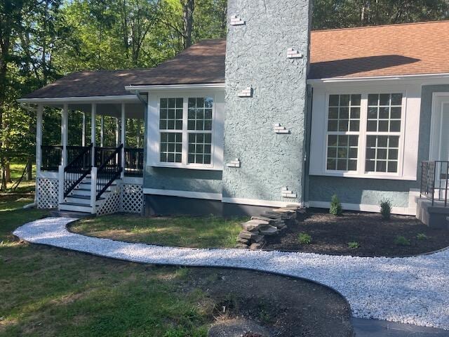 3354 Trafalgar Ave, East Stroudsburg, PA 18302 - view of side of property with a chimney and stairs
