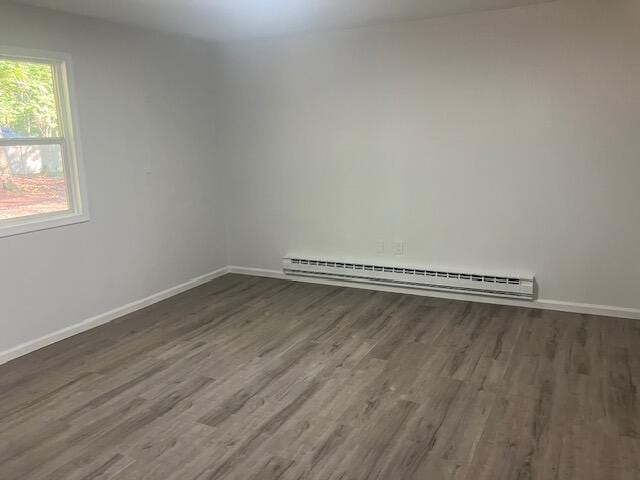 3354 Trafalgar Ave, East Stroudsburg, PA 18302 - spare room featuring a baseboard radiator and wood finished floors