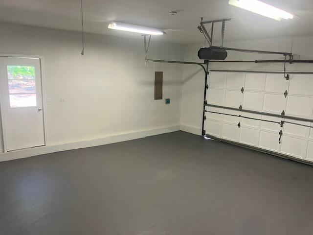 3354 Trafalgar Ave, East Stroudsburg, PA 18302 - garage with a garage door opener and electric panel