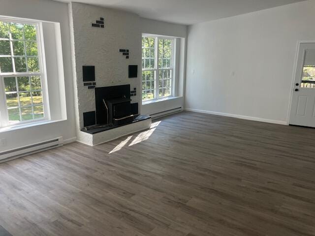 3354 Trafalgar Ave, East Stroudsburg, PA 18302 - unfurnished living room featuring wood finished floors and baseboard heating