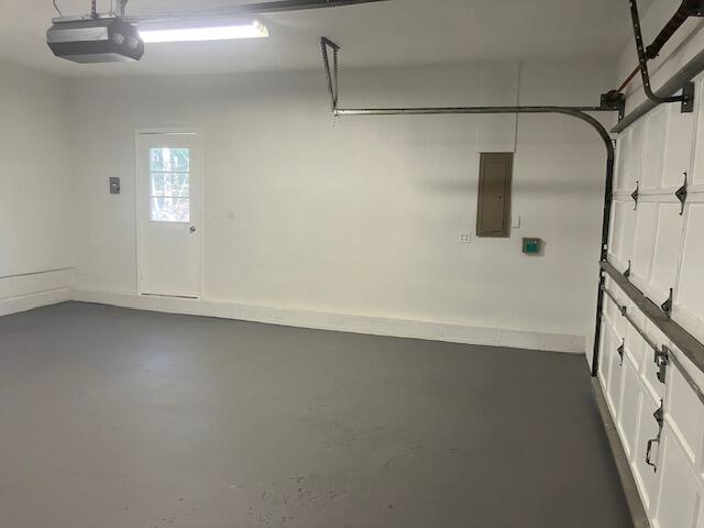 3354 Trafalgar Ave, East Stroudsburg, PA 18302 - garage with a garage door opener and electric panel
