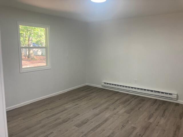 3354 Trafalgar Ave, East Stroudsburg, PA 18302 - empty room featuring baseboard heating and wood finished floors