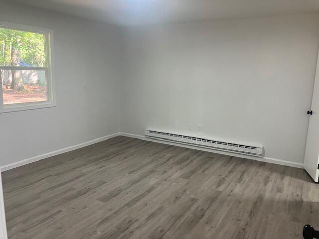 3354 Trafalgar Ave, East Stroudsburg, PA 18302 - empty room featuring a baseboard radiator and wood finished floors