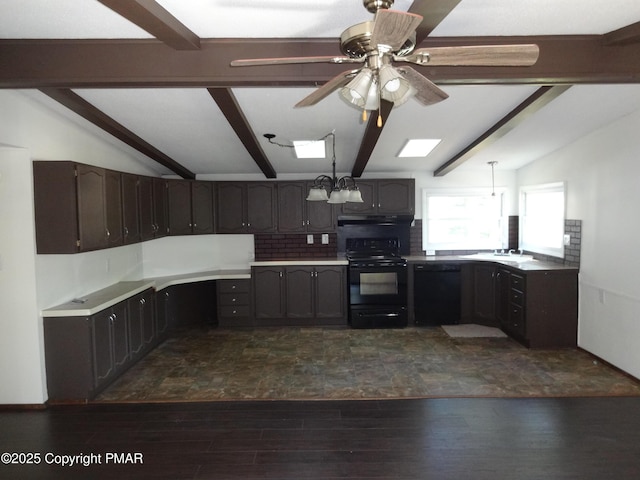 kitchen featuring vaulted ceiling with beams, black appliances, tasteful backsplash, and under cabinet range hood