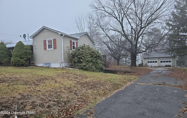 view of property exterior with a garage