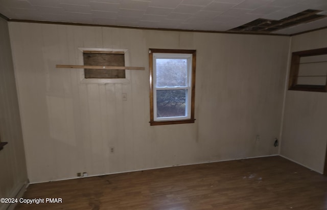 unfurnished room featuring wood finished floors