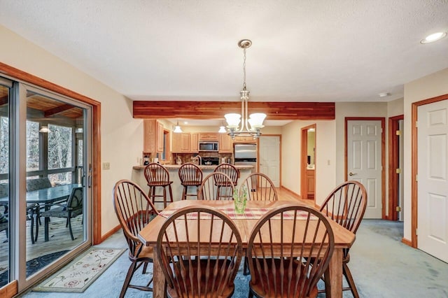 dining area with beamed ceiling, baseboards, a notable chandelier, and light carpet