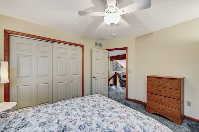 bedroom with carpet floors, a ceiling fan, baseboards, visible vents, and a closet