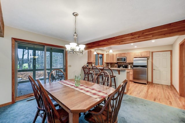 dining space with a chandelier, light wood-style flooring, recessed lighting, baseboards, and beamed ceiling
