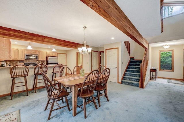 dining room featuring stairway, beamed ceiling, a notable chandelier, and light colored carpet