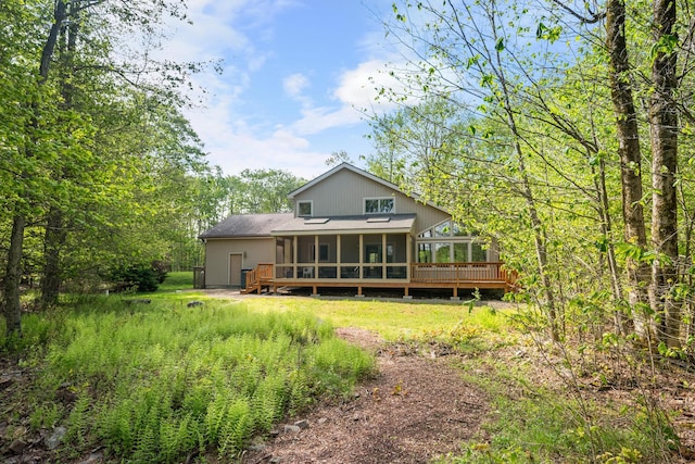 600 Conestoga Trl, Pocono Pines, PA 18350 - rear view of property with a sunroom and a deck