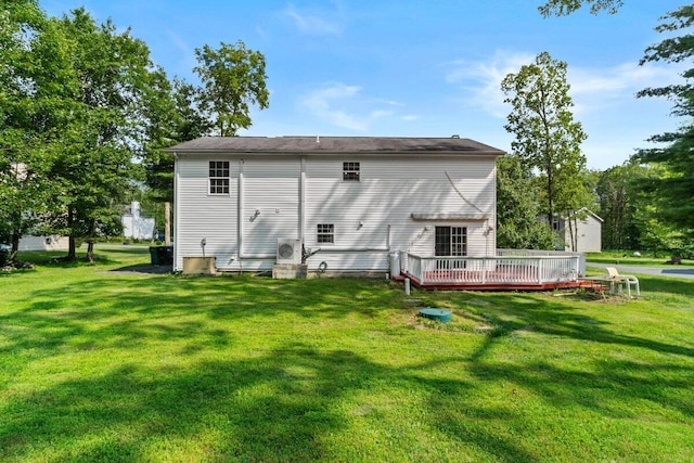 240 Timberline Dr, East Stroudsburg, PA 18301 - back of property featuring a deck and a lawn