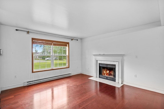240 Timberline Dr, East Stroudsburg, PA 18301 - unfurnished living room featuring a baseboard radiator, wood finished floors, and a fireplace