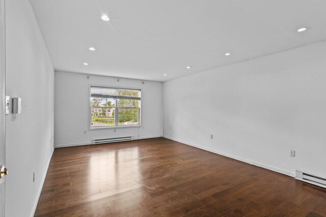 240 Timberline Dr, East Stroudsburg, PA 18301 - empty room featuring a baseboard heating unit, hardwood / wood-style flooring, and recessed lighting