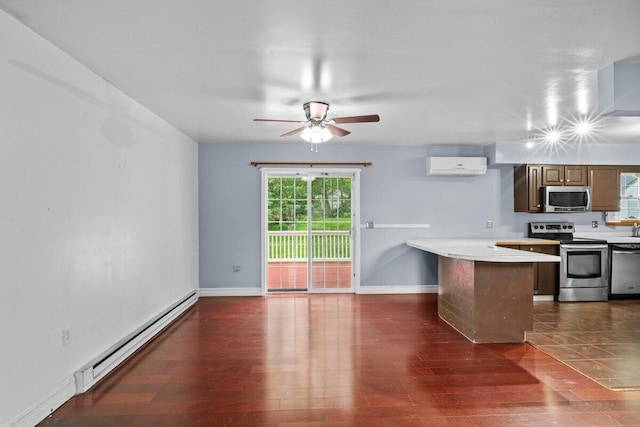 240 Timberline Dr, East Stroudsburg, PA 18301 - kitchen with stainless steel appliances, a baseboard heating unit, a peninsula, a ceiling fan, and light countertops