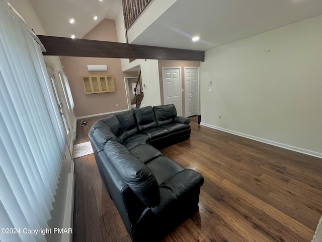 living room featuring high vaulted ceiling and dark hardwood / wood-style flooring