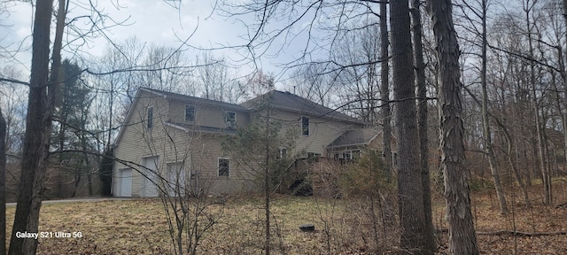 361 Great Bear Way Rd, East Stroudsburg, PA 18302 - view of side of home featuring a gambrel roof and a garage