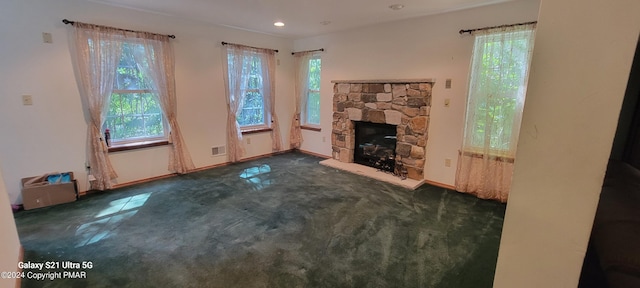 361 Great Bear Way Rd, East Stroudsburg, PA 18302 - unfurnished living room with carpet flooring, a stone fireplace, baseboards, visible vents, and recessed lighting