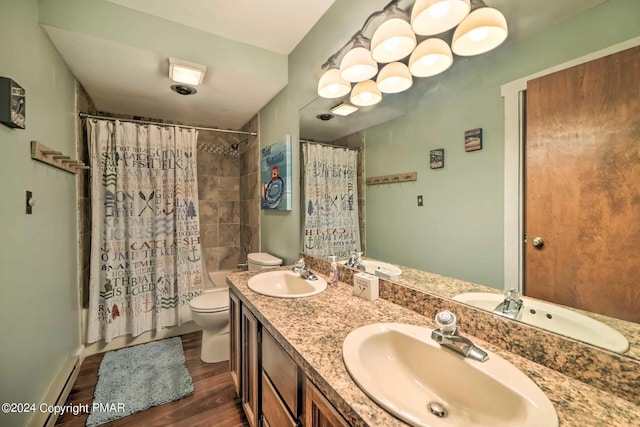 full bath featuring shower / bathtub combination with curtain, toilet, and a sink