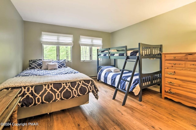 bedroom with wood finished floors