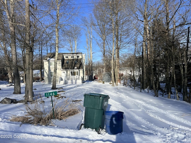 view of yard covered in snow