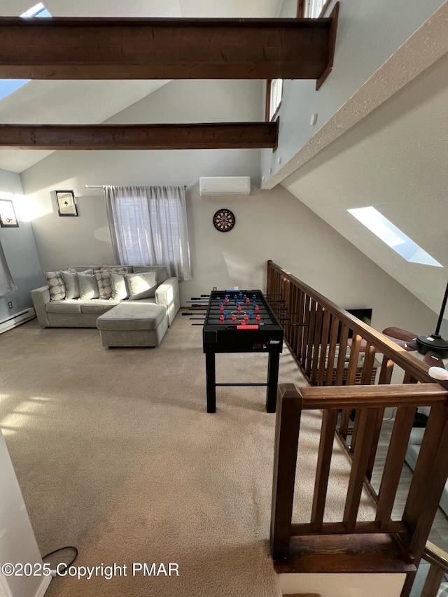 recreation room with a baseboard heating unit, vaulted ceiling with skylight, a wall mounted AC, and carpet flooring