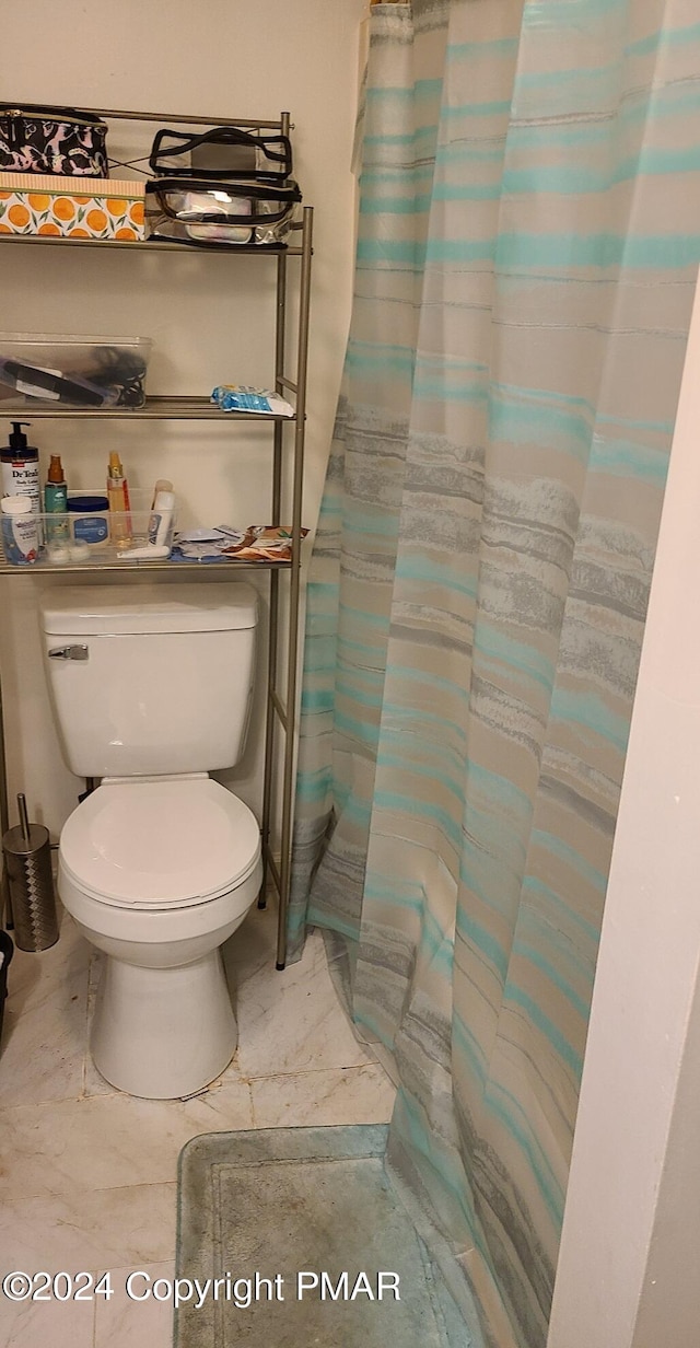 full bath featuring toilet