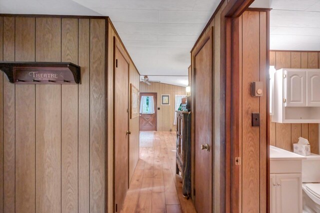 115 Alpine Ct, Pocono Pines, PA 18350 - hallway featuring wooden walls and light wood-style floors