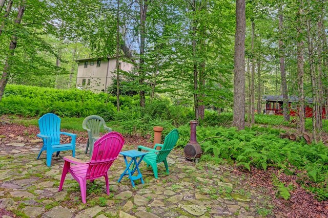 115 Alpine Ct, Pocono Pines, PA 18350 - view of patio featuring a fire pit