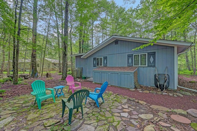 115 Alpine Ct, Pocono Pines, PA 18350 - rear view of house featuring a patio
