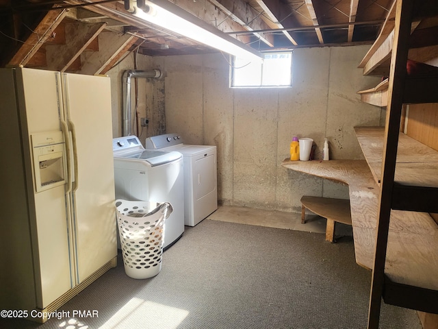 laundry room with laundry area and washer and clothes dryer