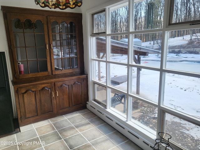 interior space with a baseboard heating unit