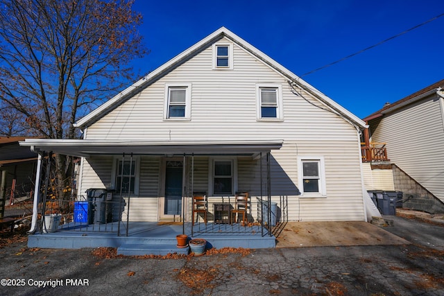 view of front of property featuring covered porch