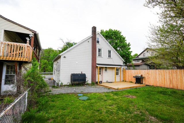 30 Little Gap Rd, Palmerton, PA 18071 - back of property with a deck, a chimney, heating fuel, and a fenced backyard