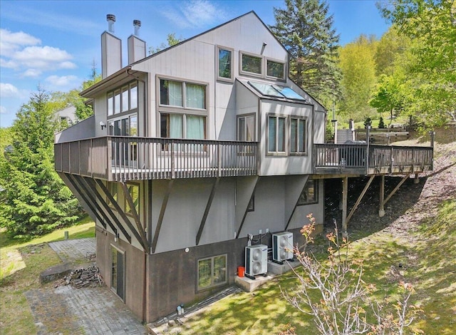 298 Overlook Way, Tannersville, PA 18372 - rear view of house with a chimney, a deck, and central AC