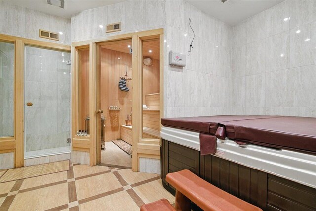 298 Overlook Way, Tannersville, PA 18372 - misc room featuring tile walls and inlaid floor details
