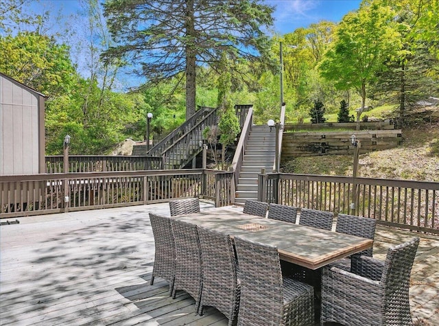 298 Overlook Way, Tannersville, PA 18372 - wooden terrace featuring outdoor dining space, stairway, and view of wooded area