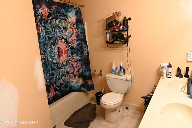 full bath featuring toilet, a sink, baseboards, tile patterned floors, and shower / bath combo with shower curtain